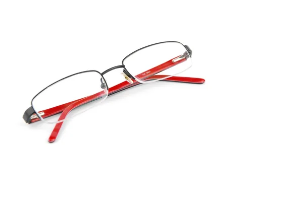 Röda glasögon på vit — Stockfoto