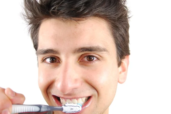 彼の歯を洗うかわいい男 — ストック写真