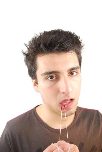 Uomo filo interdentale i denti (non voglio espressione ) — Foto Stock