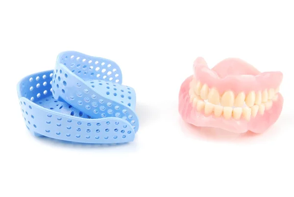 Denture and trays — Stock Photo, Image