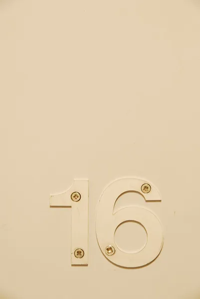 Flat number: 16 — Stock Photo, Image
