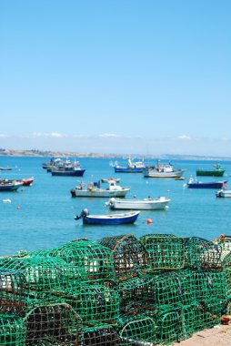 Old fishing equipment in the port of Cascais, Portugal clipart