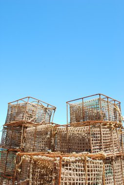Old fishing cages in the port of Cascais, Portugal clipart