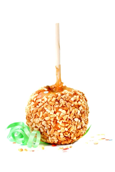 Caramel candy apple with peanuts — Stock Photo, Image