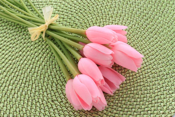 stock image Pink decorative tulips on green