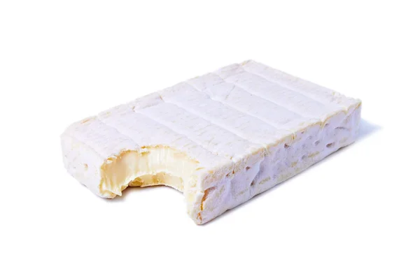 Gebissenes Stück Gourmet-Brie-Käse — Stockfoto