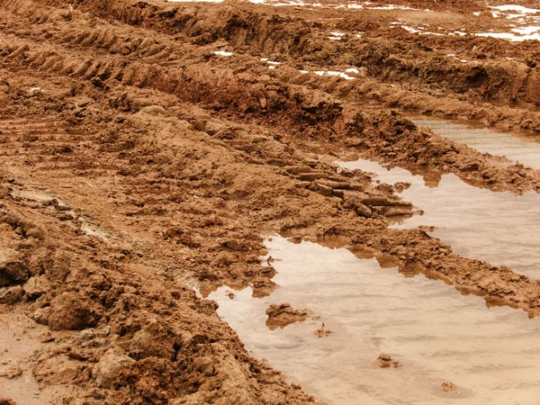 Road dirty spring clay — Stock Photo, Image