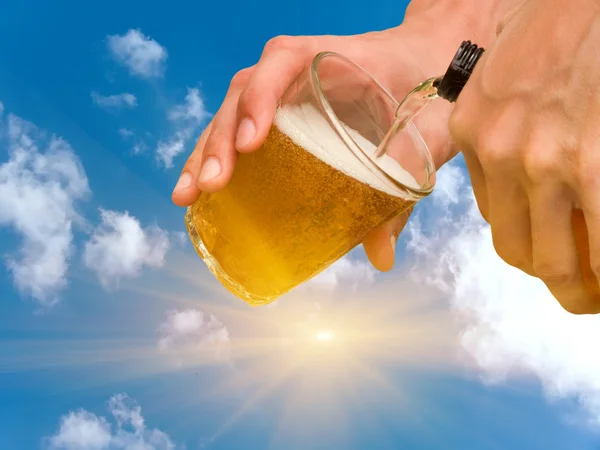 Hands person pouring beer Royalty Free Stock Photos