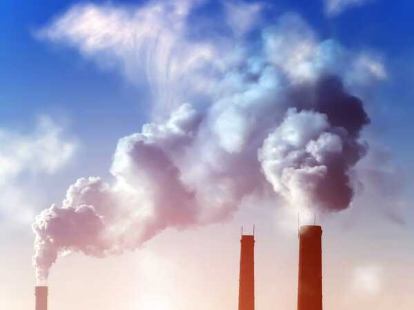 Smoke pipes factory sunset