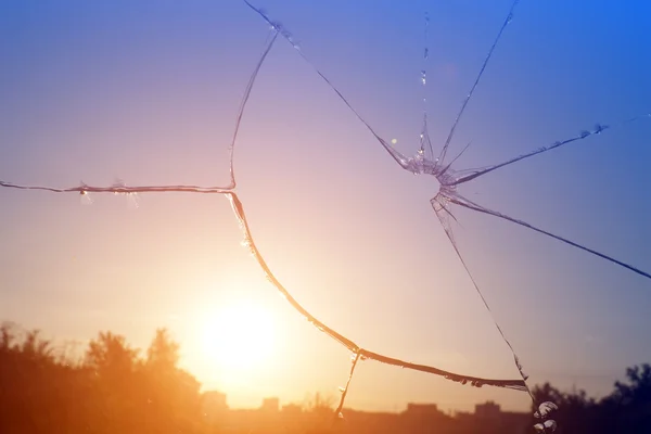 Glass broken window sunset