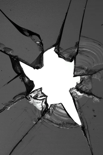 Glass broken hole; cracks — Stock Photo, Image