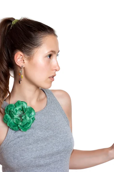 Beautiful girl with a flower brooch — Stock Photo, Image