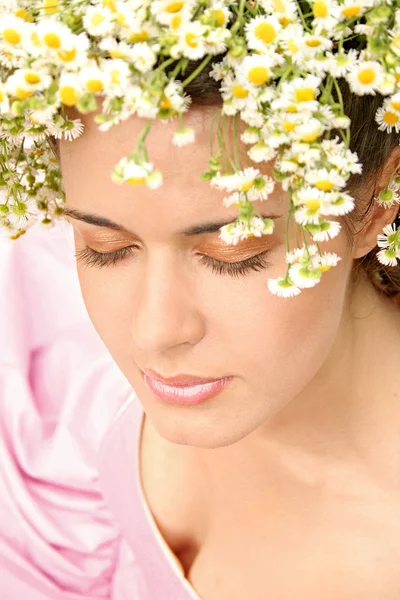 Girl in a flower wreath — Stock Photo, Image