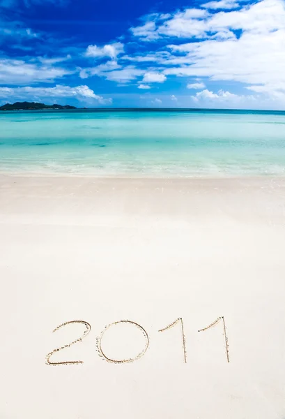 Year 2011 writenn in the sand — Stock Photo, Image