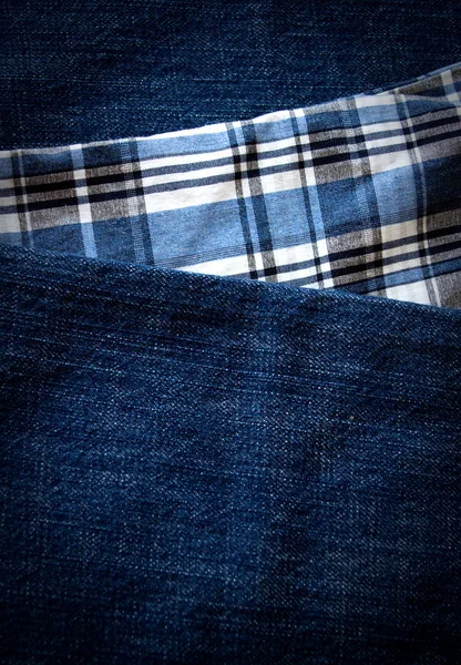 Вертикальный фон джинсов — стоковое фото