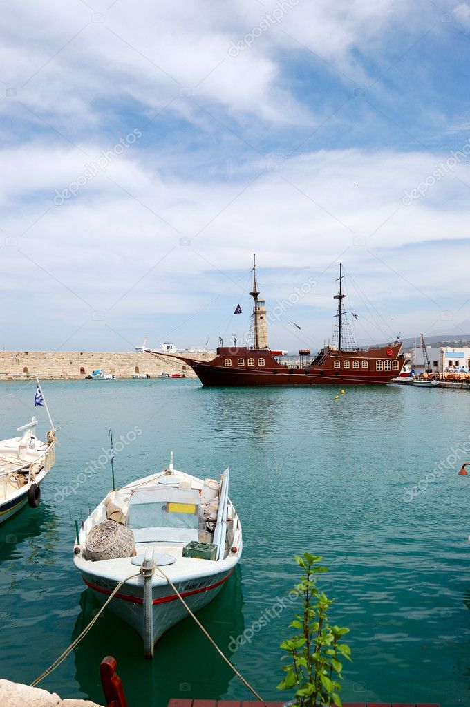 Venetian harbour of Rethymno with pirate ship