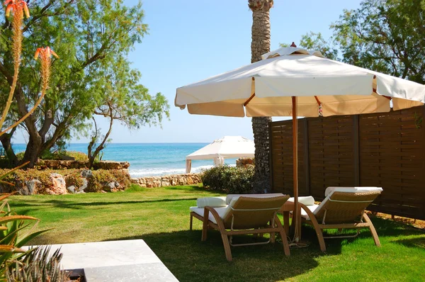 Sunbeds at the luxury villa, Crete, Greece — Stock Photo, Image