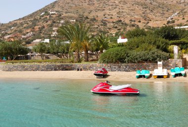 Jet ski at the beach of luxury hotel, Crete, Greece clipart