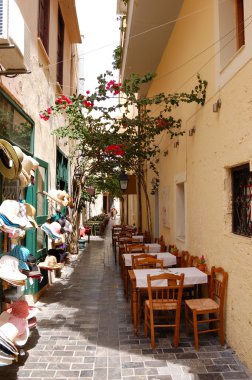 Outdoor restaurant in old city part of Retimno, Crete, Greece clipart