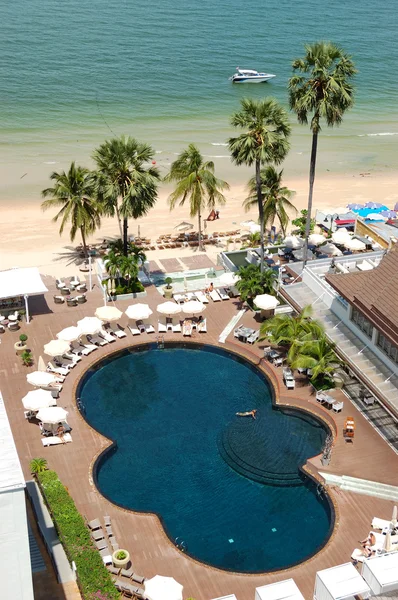 Swimming pool at the beach of popular hotel, Pattaya, Thailand Royalty Free Stock Photos