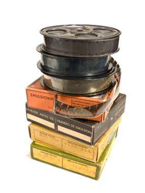 Pile of 16mm films and its boxes clipart