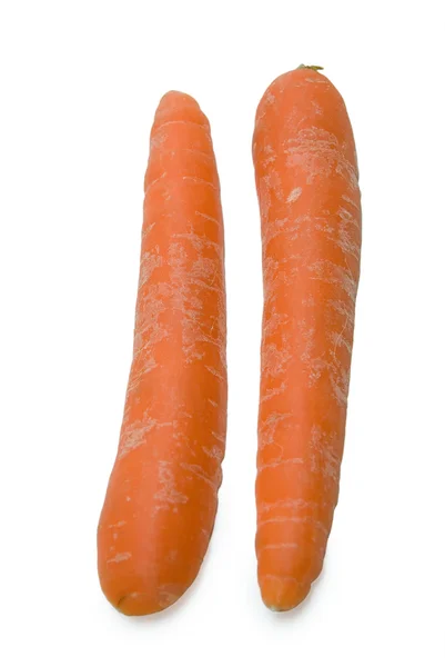 Zanahorias aisladas sobre un fondo blanco —  Fotos de Stock
