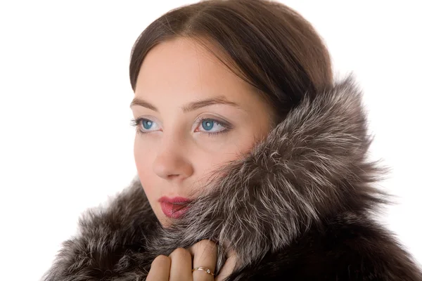 Young girl in a fur coat — Stock Photo, Image