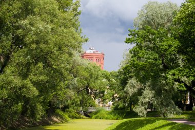 Landscape with red tower clipart