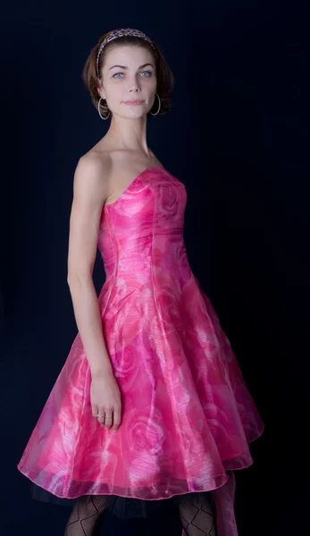 Дівчина в рожевій сукні — стокове фото