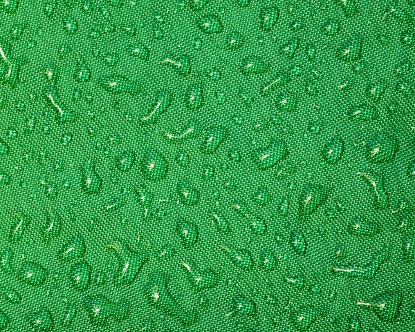 Drops against green — Stock Photo, Image