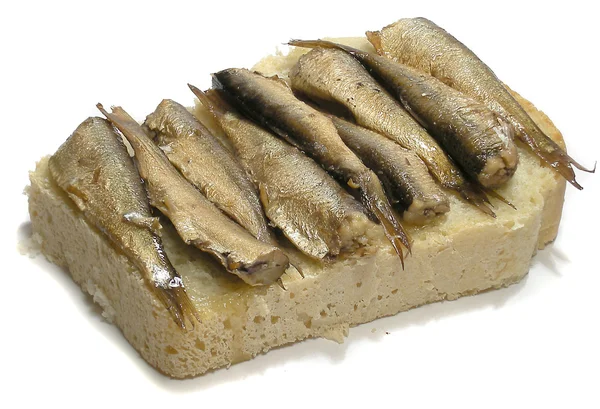 Espadilhas em óleo sobre pão — Fotografia de Stock