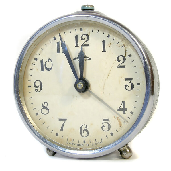 Alarm bell clock on white background