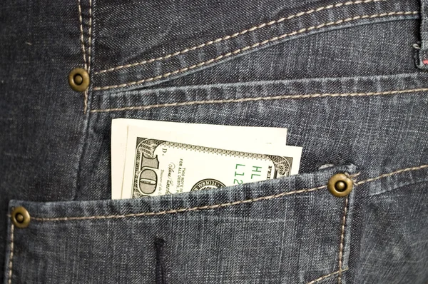 Geld in der Tasche — Stockfoto