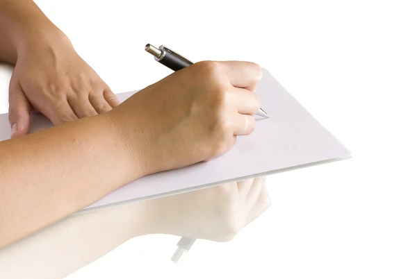 Penna i hand skriva på sidan — Stockfoto