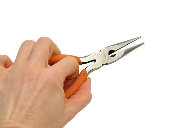 Pliers in hand — Stock Photo, Image
