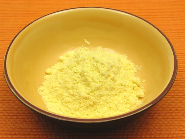 Cornmeal in a bowl of ceramic — Stock Photo, Image