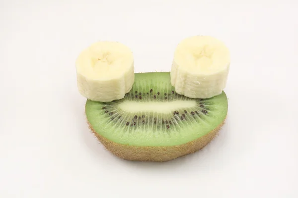 Grande kiwi verde e banana fruta — Fotografia de Stock