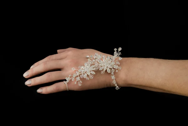 Elegant bracelet on a hand of the girl — Stock Photo, Image
