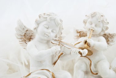 Figurines in the form of the angel clipart