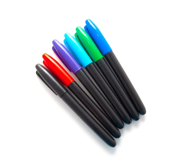 Uppsättning av flerfärgade pennor på en vit bakgrund — Stockfoto
