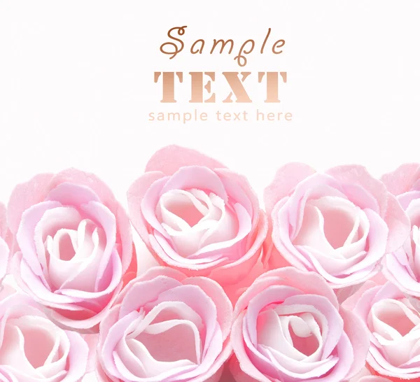 Toppen van kunstmatige roze rozen close-up — Stockfoto