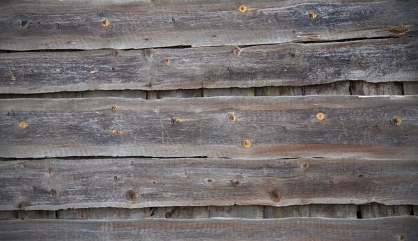 Achtergrond in een grunge stijl in de vorm van oude houten planken — Stockfoto