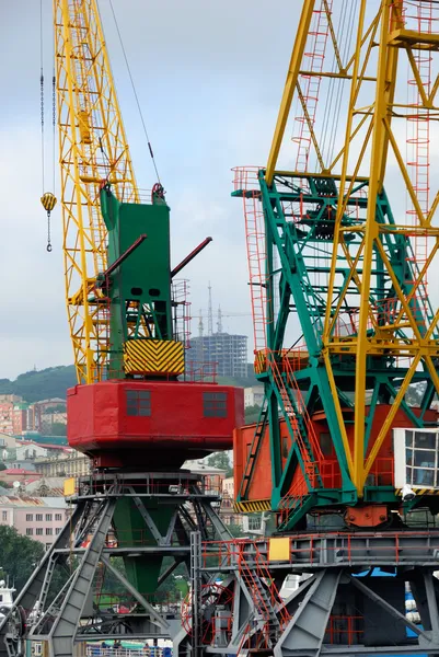Two colored port cranes — Stock Photo, Image