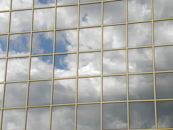 Stock image Sky reflexion in the glass house