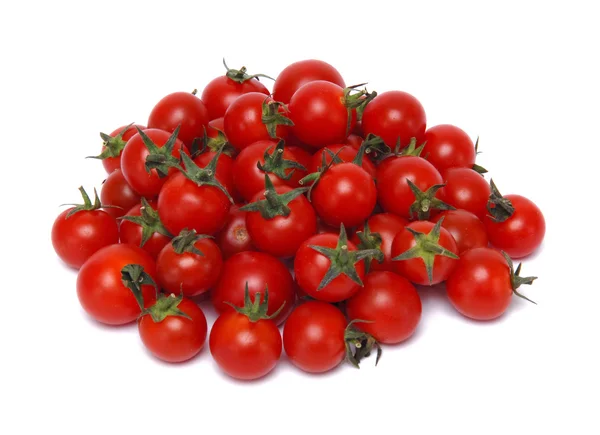 Pequeno tomate cereja no fundo branco fechar — Fotografia de Stock