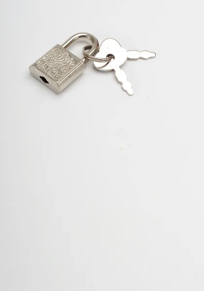 Fechadura pequena e chave — Fotografia de Stock