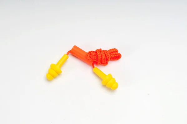 Orange earplugs isolated on white — Stock Photo, Image