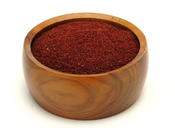 The paprika powder in wooden bowl — Stock Photo, Image
