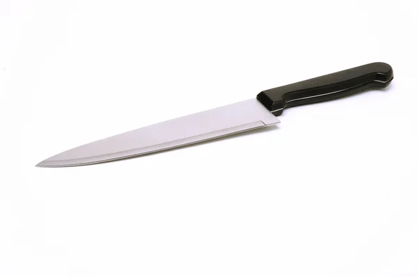 Kırpma yolu ile beyaz zemin üzerinde bir bıçak yakın çekim — Stok fotoğraf