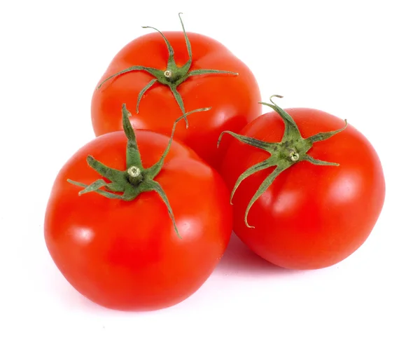 Tomates isolados em vidro branco — Fotografia de Stock